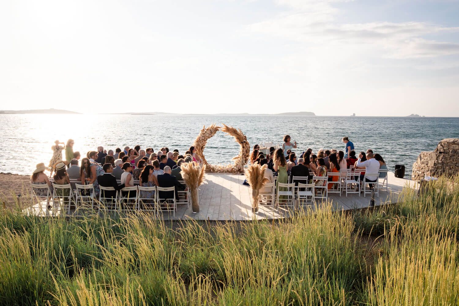 Wide shot of the wedding ceremony setup at Seesoo beachside venue