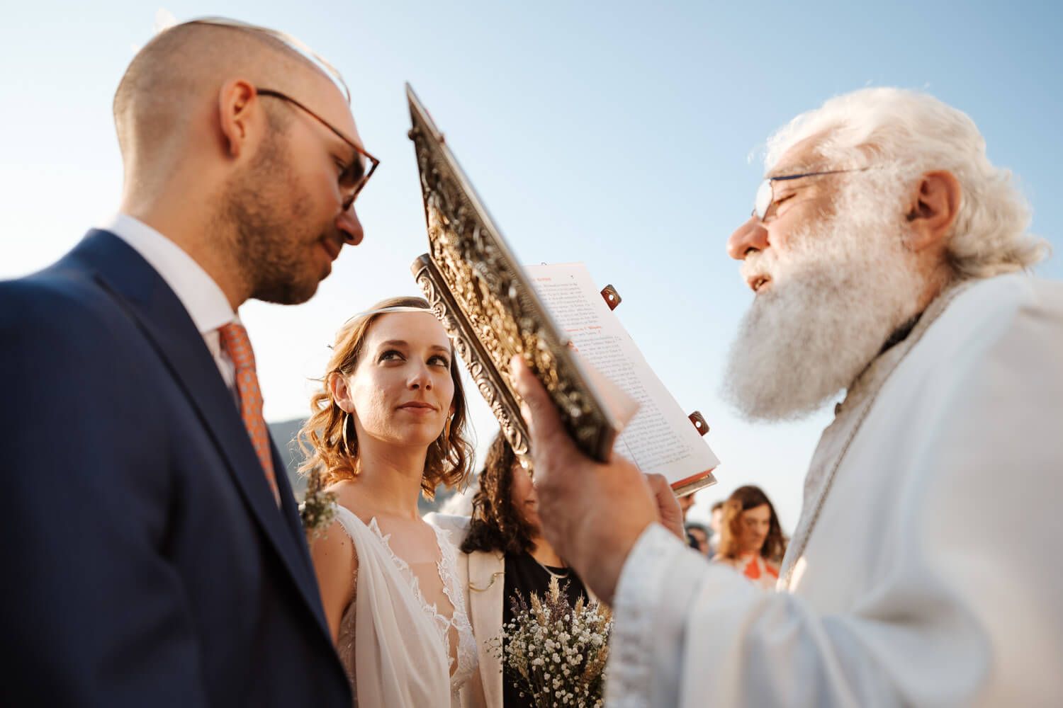 Bride and groom sharing a happy look during their Paros wedding