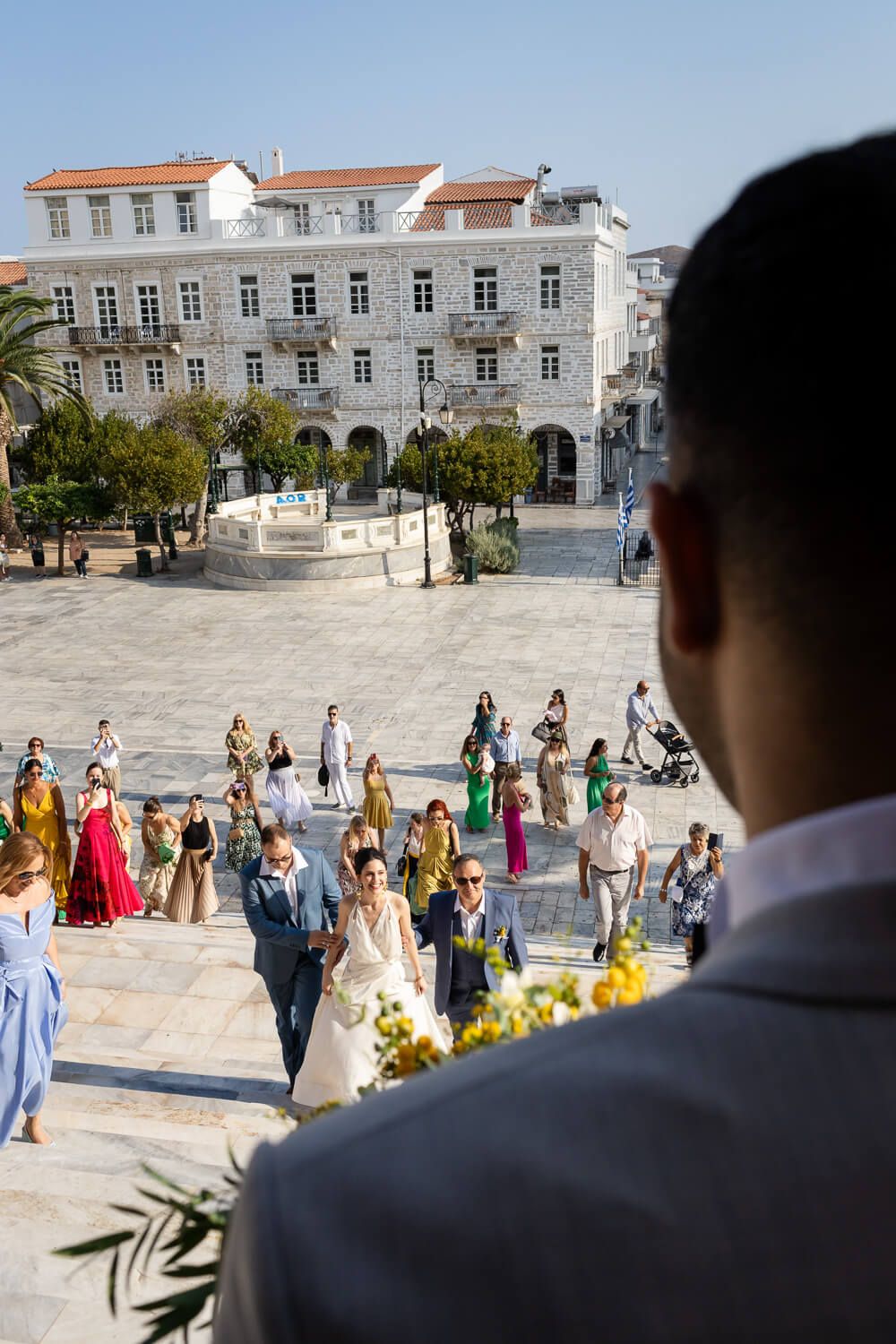 Groom Akshay waiting excitedly at the Ermoupolis Town Hall
