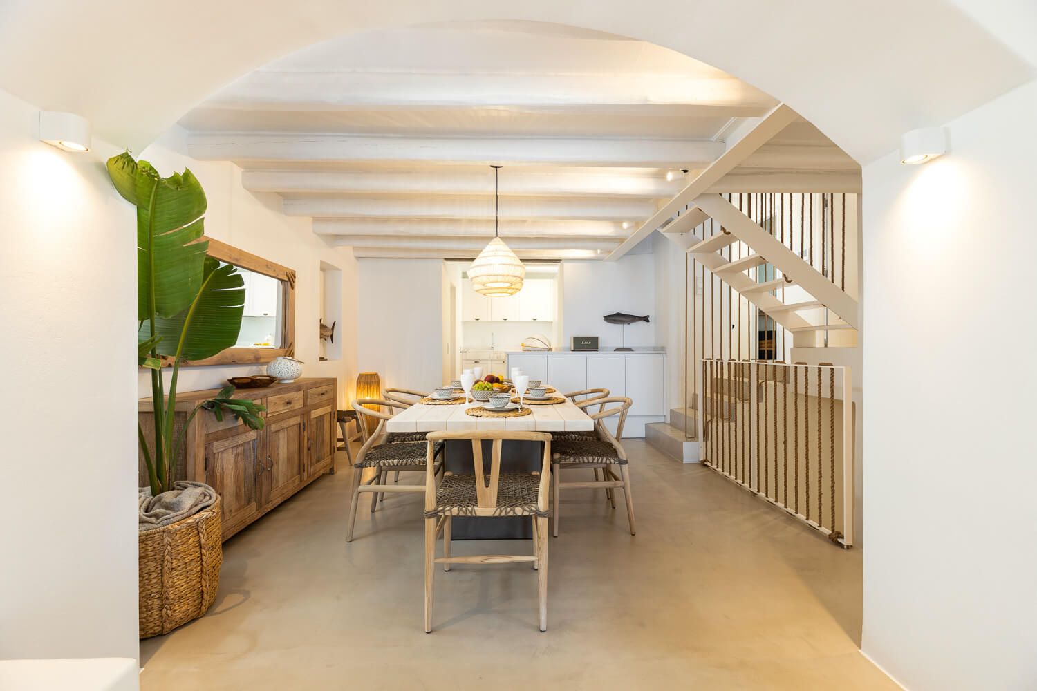 Beautifully styled dining table ready for a Mediterranean summer in Paros
