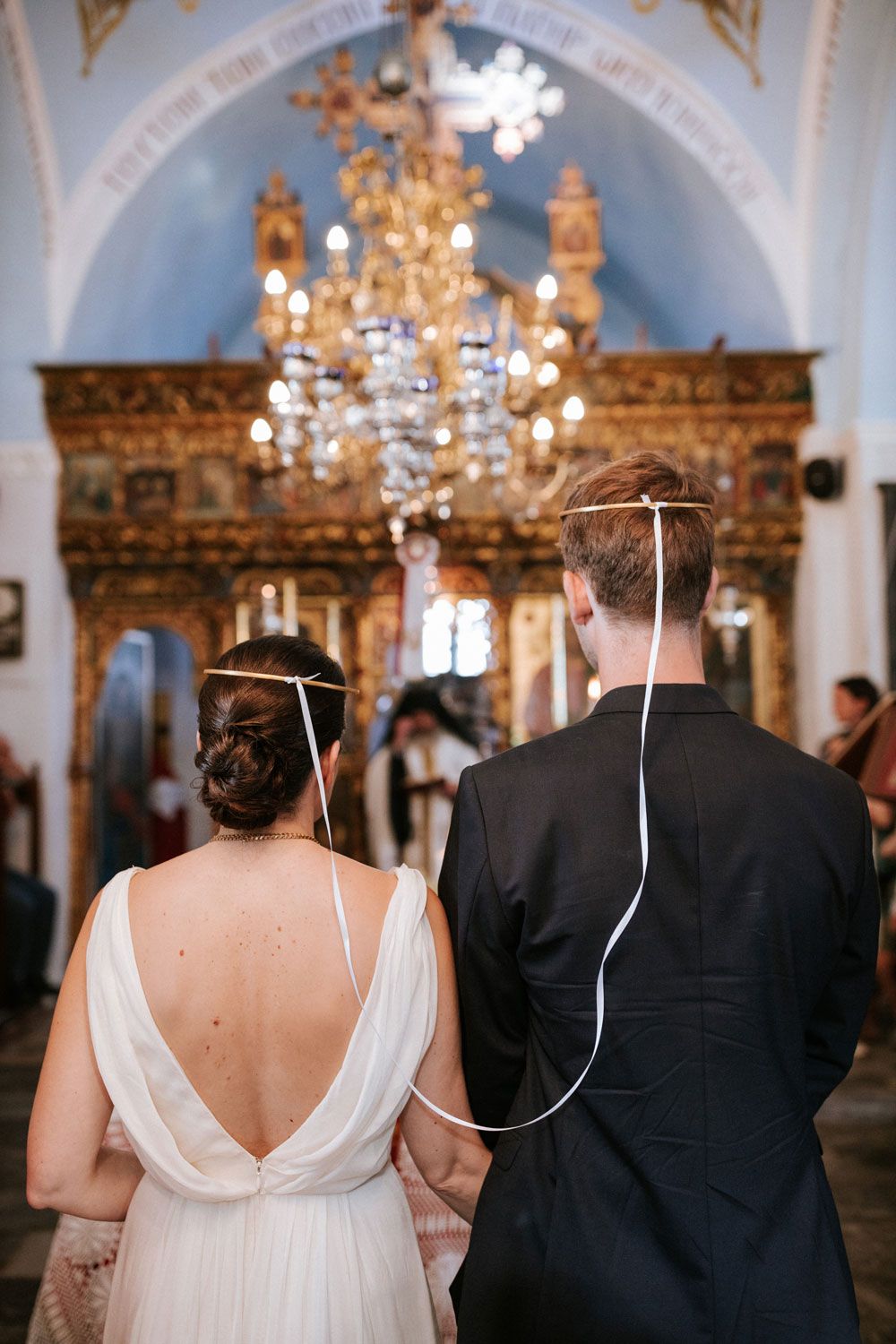 Nora and David during their wedding ceremony in Amorgos