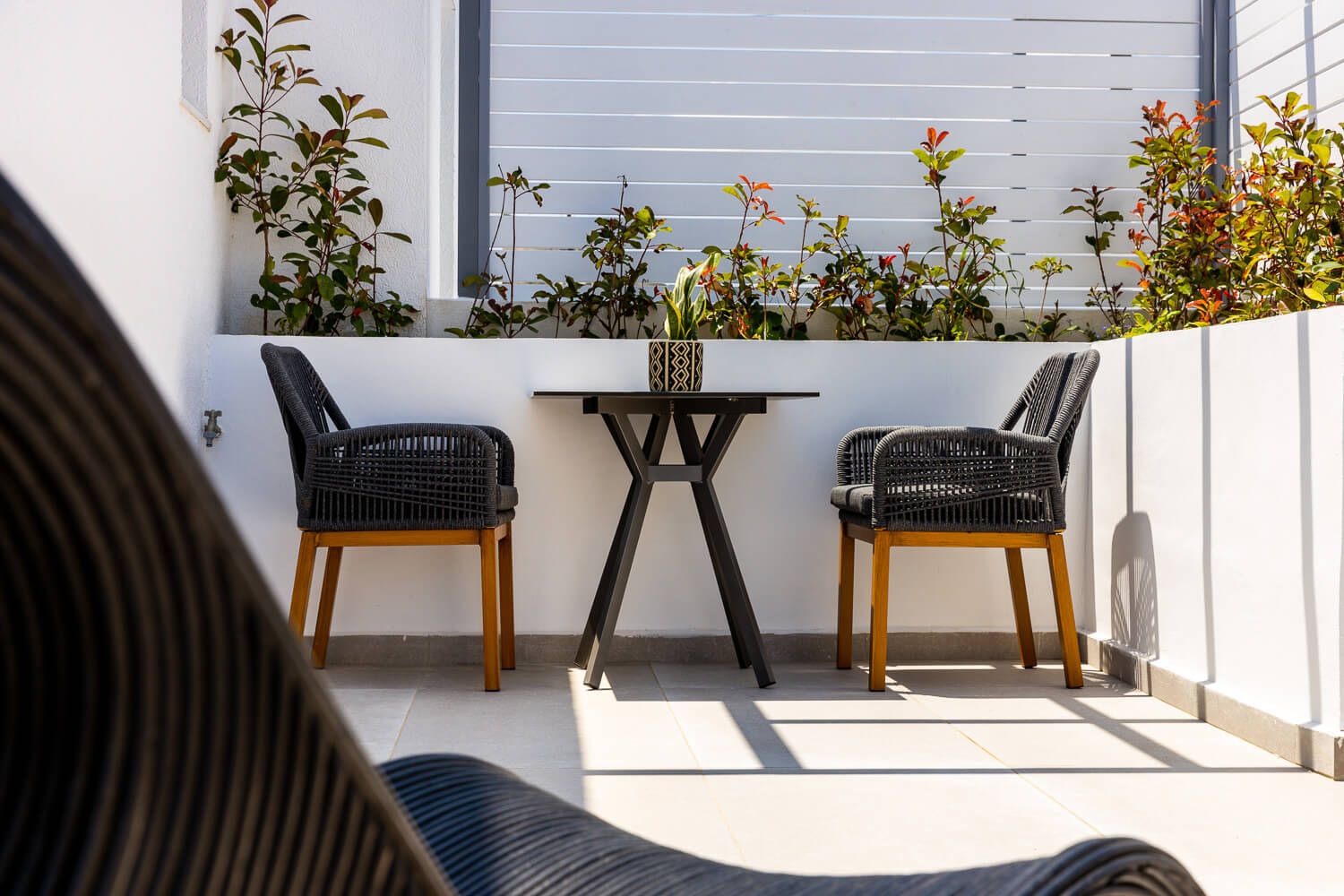 Elegant outdoor setup at a boutique Naoussa hotel