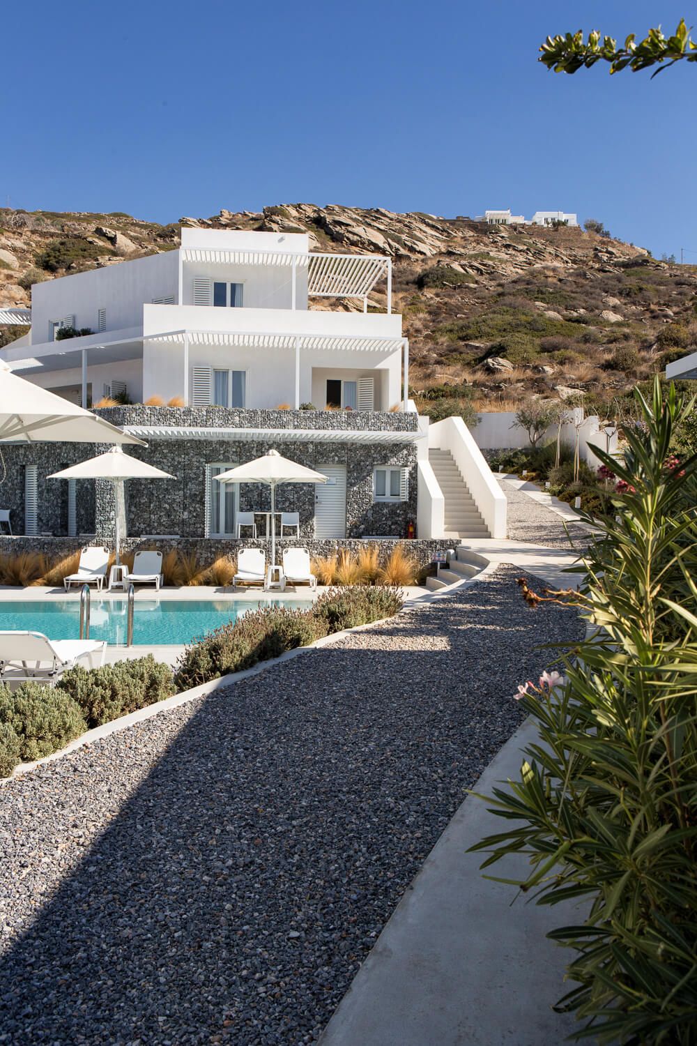 The airy public spaces of a boutique Greek island destination