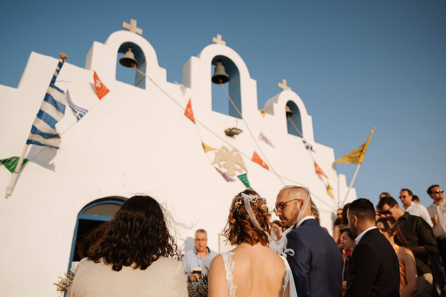 Bride and groom looking ay each other during their Paros wedding