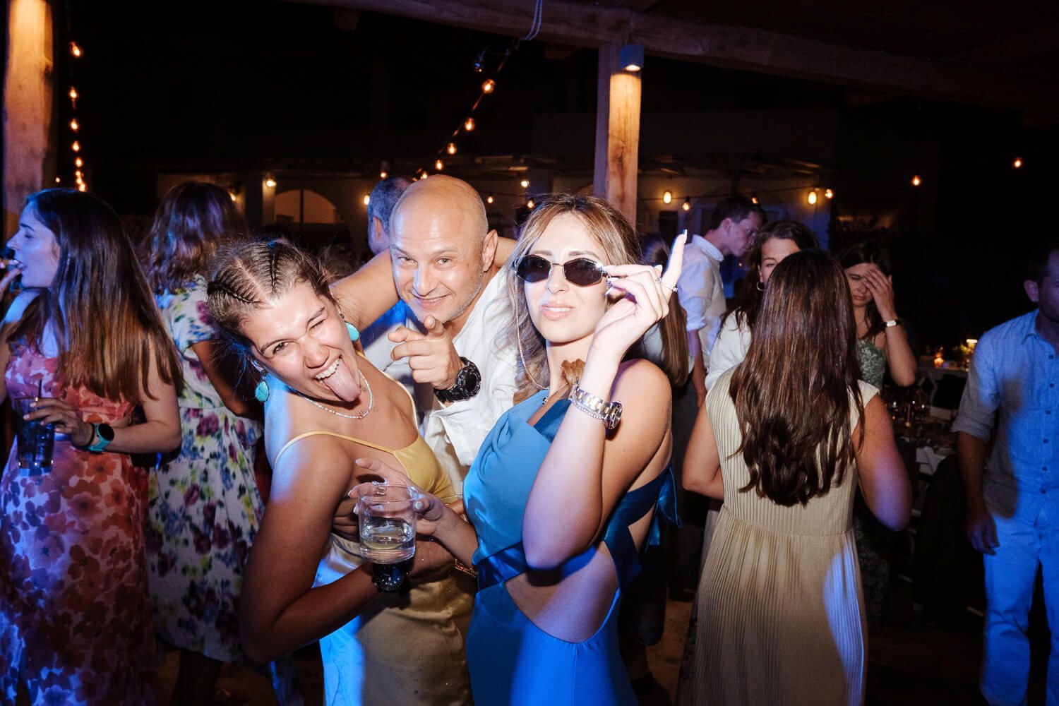 Cinematic party photography with colorful lights at Rebel Bar