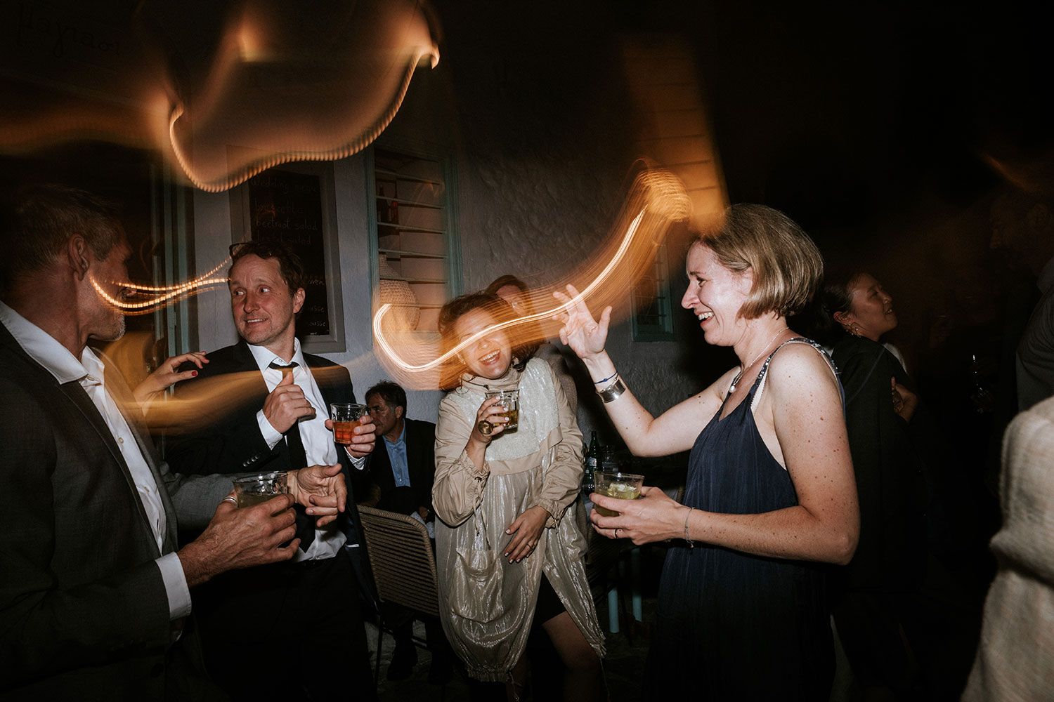 Candid wedding party moments at Magiasi Amorgos
