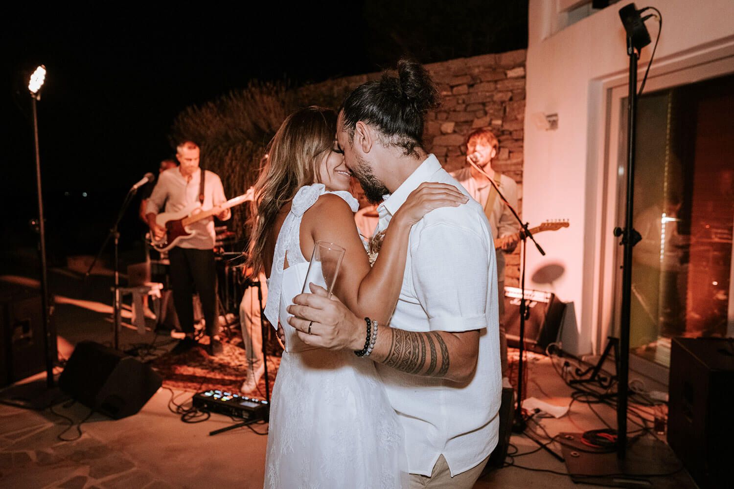 The couple sharing a romantic but fun first dance under the stars