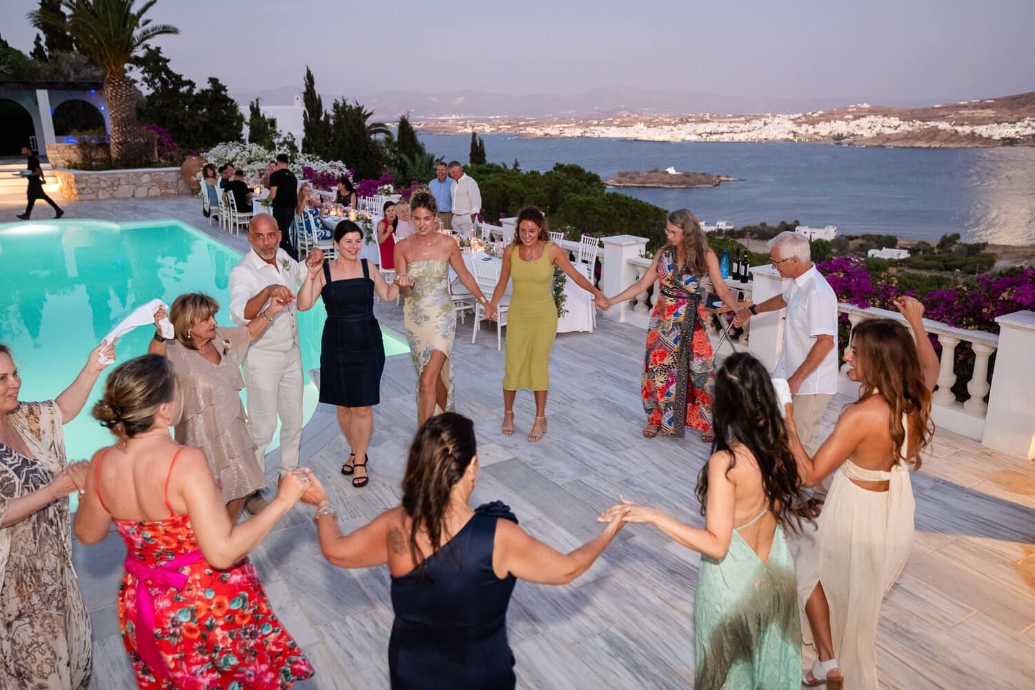 Bride and groom enjoying Greek dancing at their Petra Farm reception