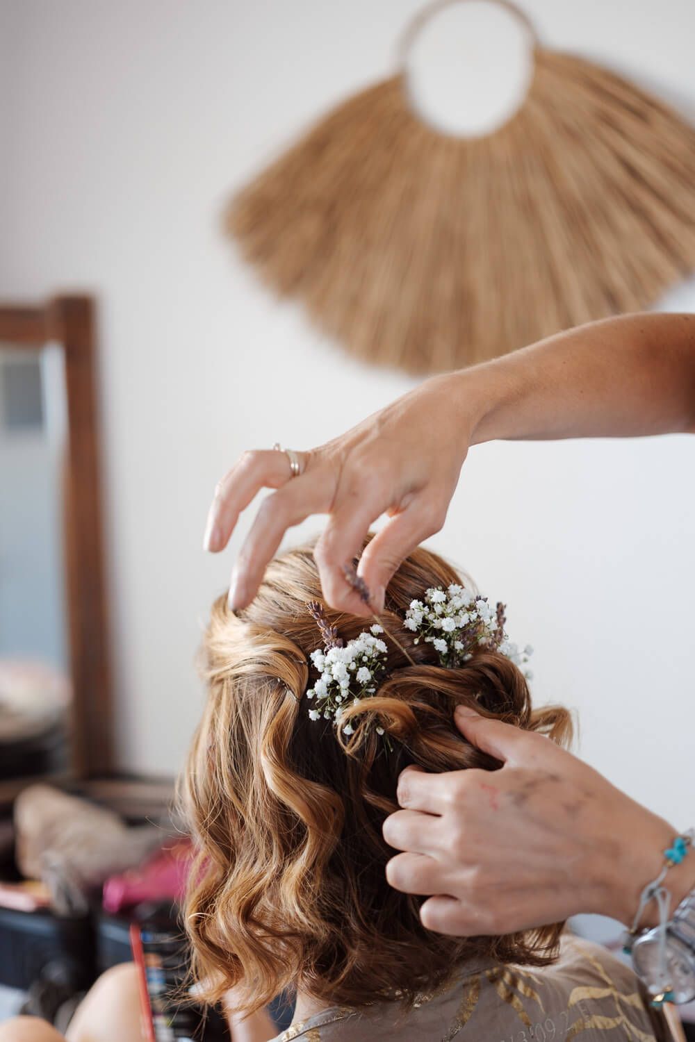 Bridal makeup and hair preparations for a Greek destination wedding