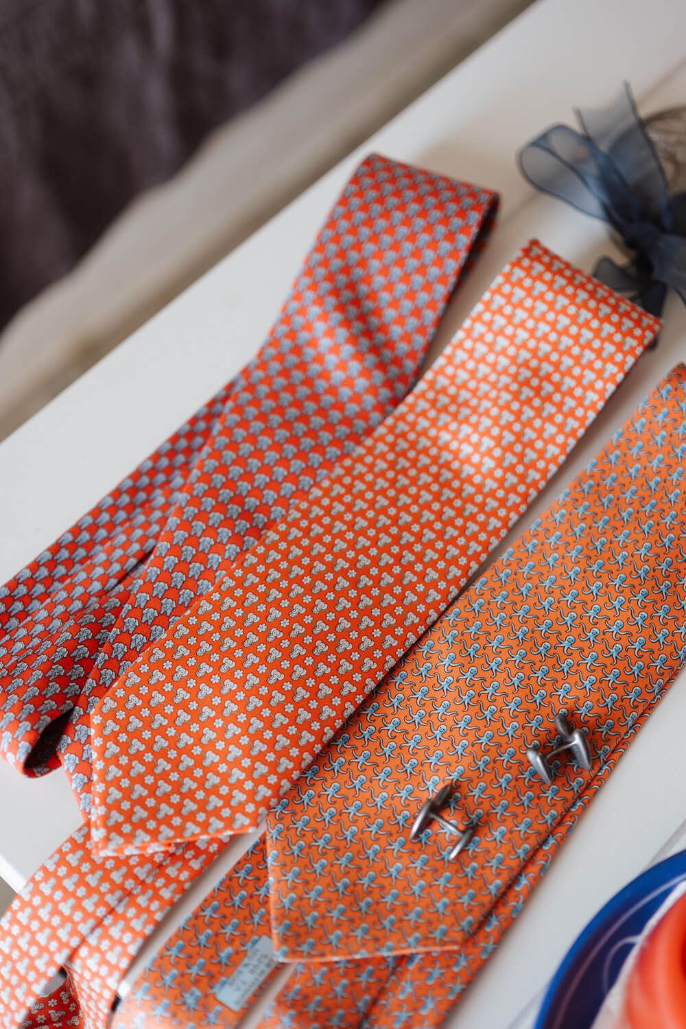 Close up of groom's accessories in Chryssi Akti