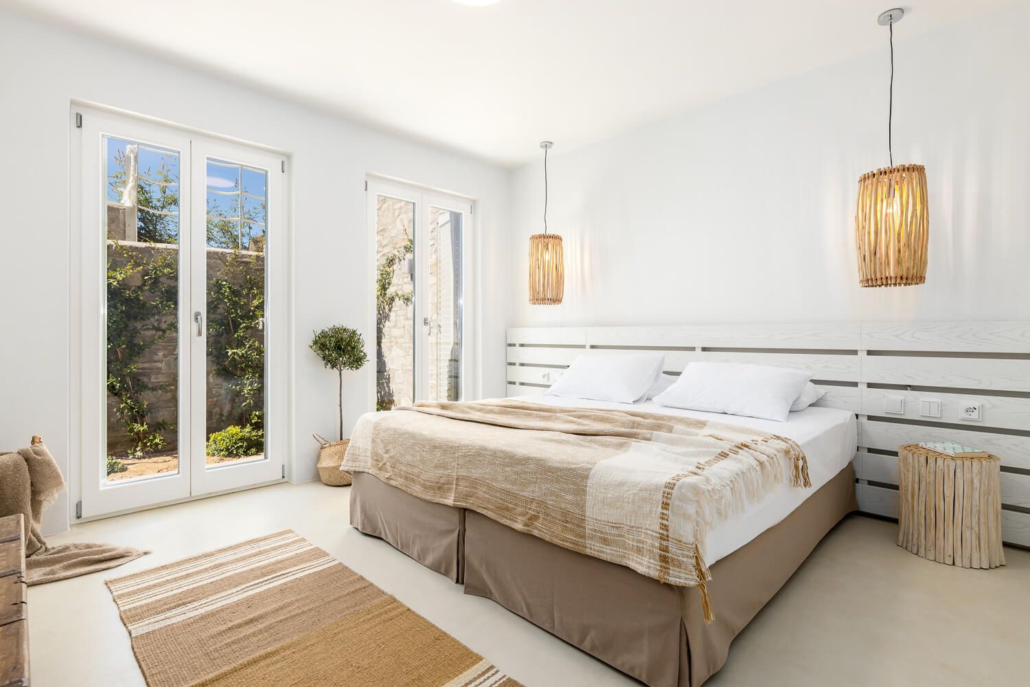 Inviting bedroom flooded with natural Cycladic light in Paros Greece