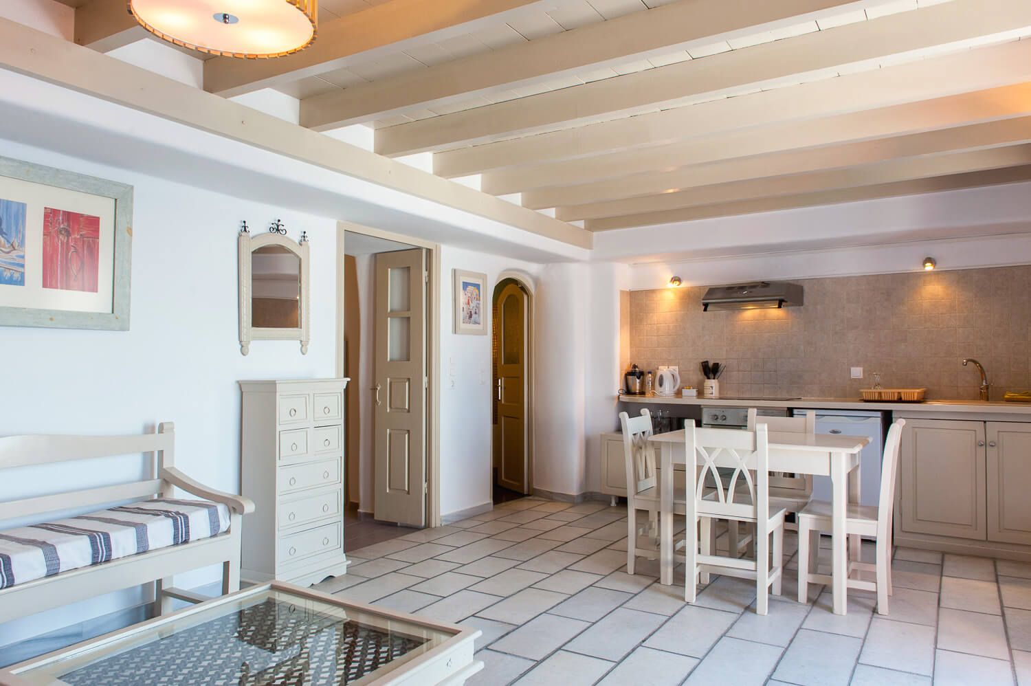 Bespoke Cycladic furniture inside an exclusive caldera view suite