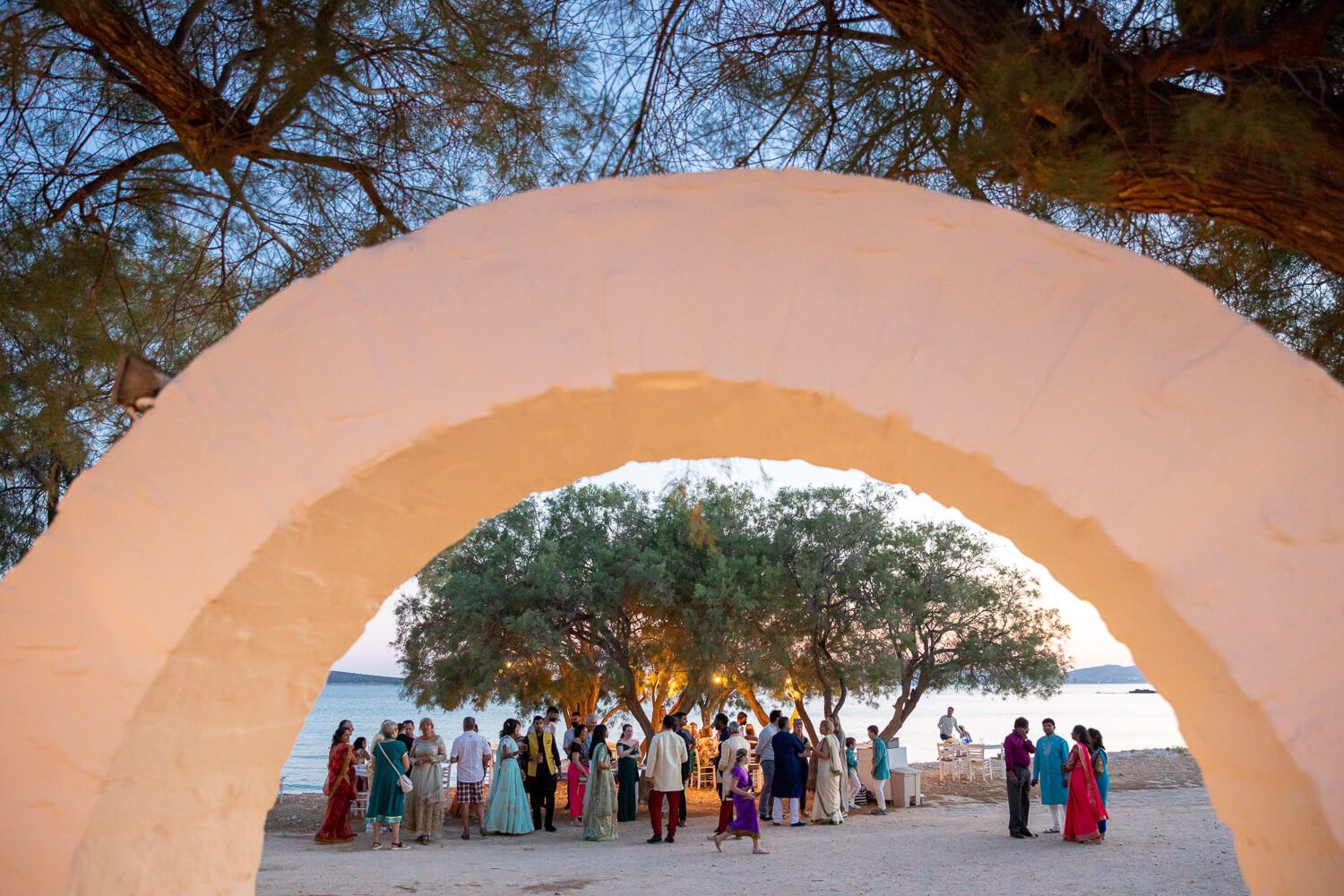 Guests dancing outside Thalassamou restaurant before the wedding dinner