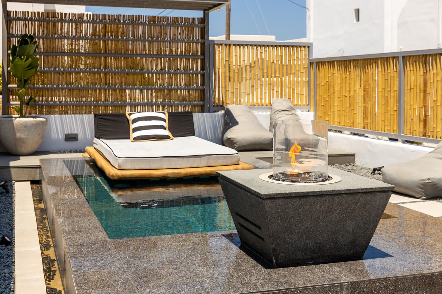 Elaborately designed outdoor pool area at a Naoussa lifestyle resort