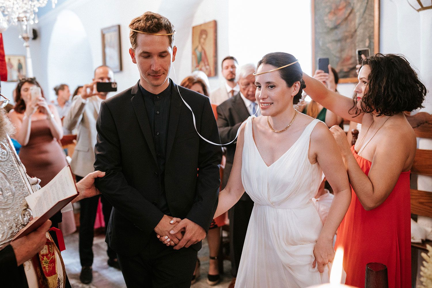 Emotional moments during the wedding exchange of crowns in Amorgos