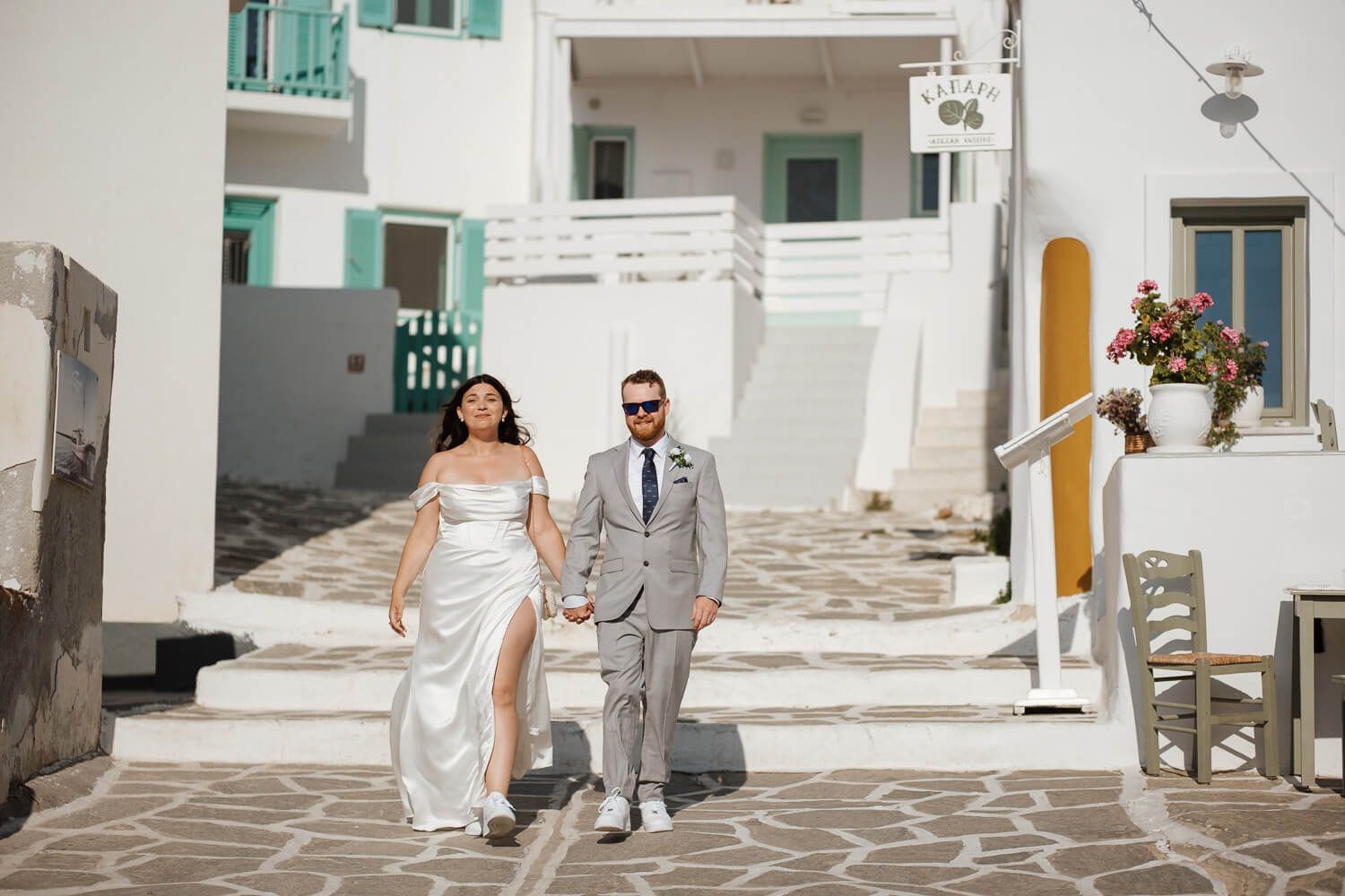 Couple exploring the hidden corners of Naoussa Paros