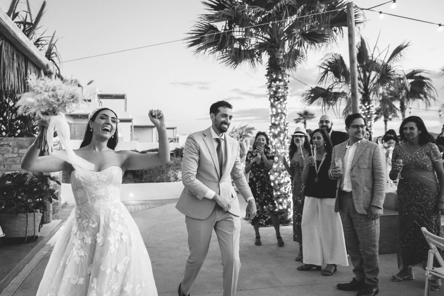 couple entering the venue during weddding reception at Seesoo Paros