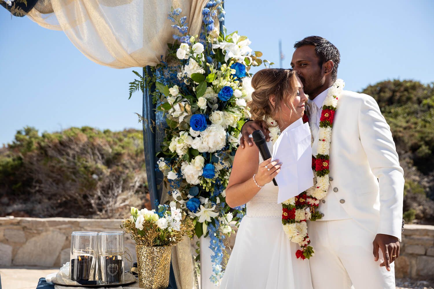 Emotional vow exchange during a modern Indian wedding in Paros