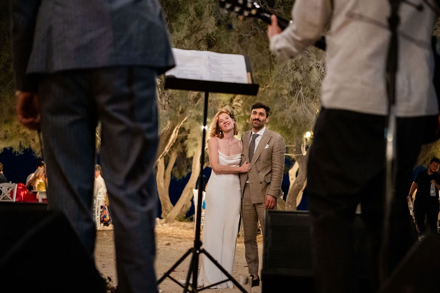 Bride laughing during heartfelt speeches at Thalassa Mou Paros