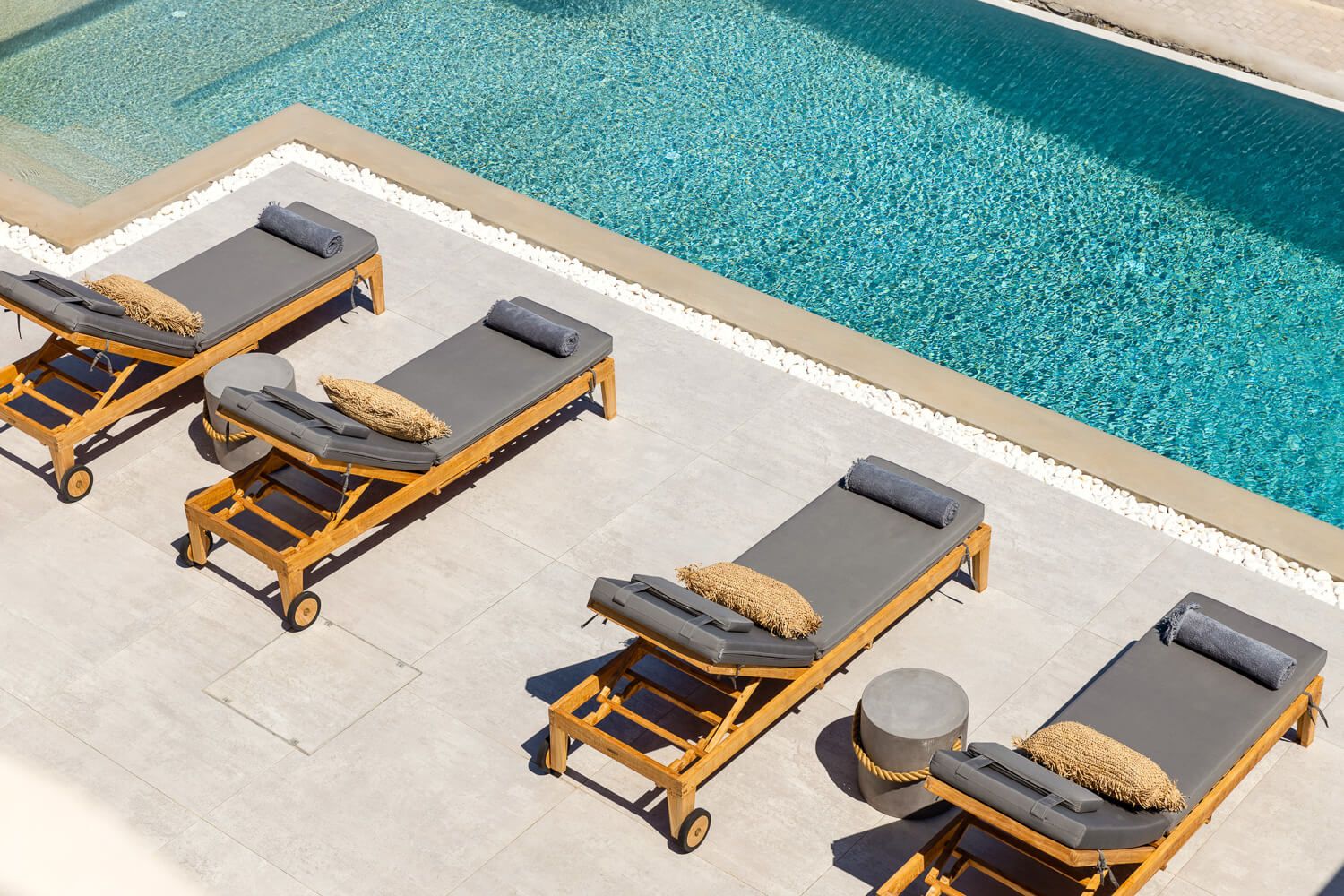 Sun-drenched private pool terrace in a Cycladic residential complex