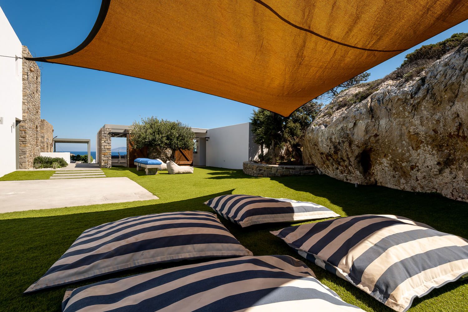 e grand scale of outdoor living spaces in a Mediterranean getaway