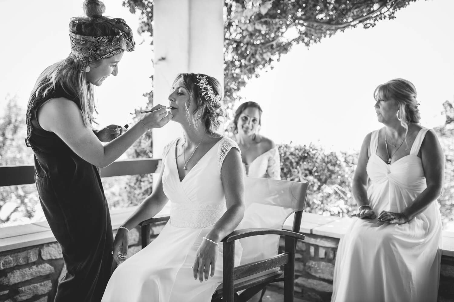 Beautiful bride having her makeup done for her Pyrgaki Paros wedding