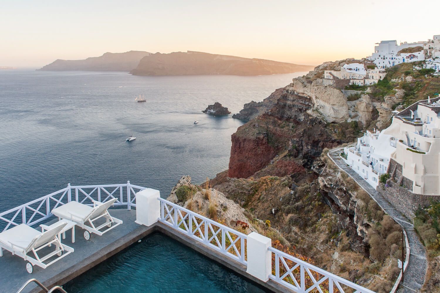 Panoramic caldera views from a luxury Armeni Village balcony