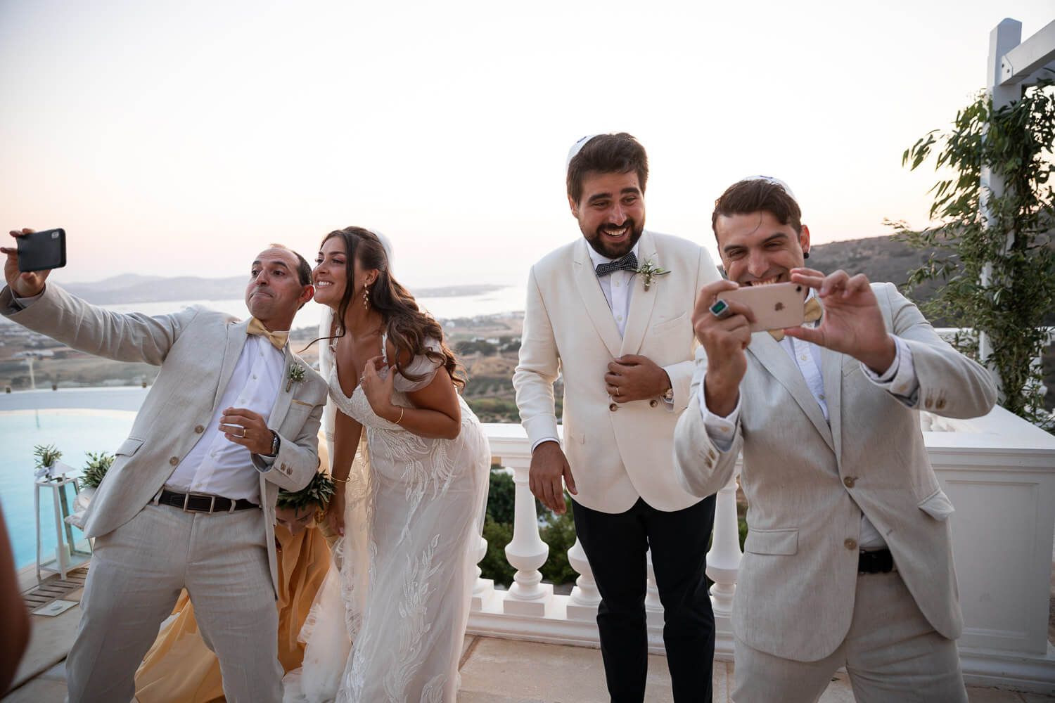 Newlyweds posing after their Jewish wedding ceremony in Greece