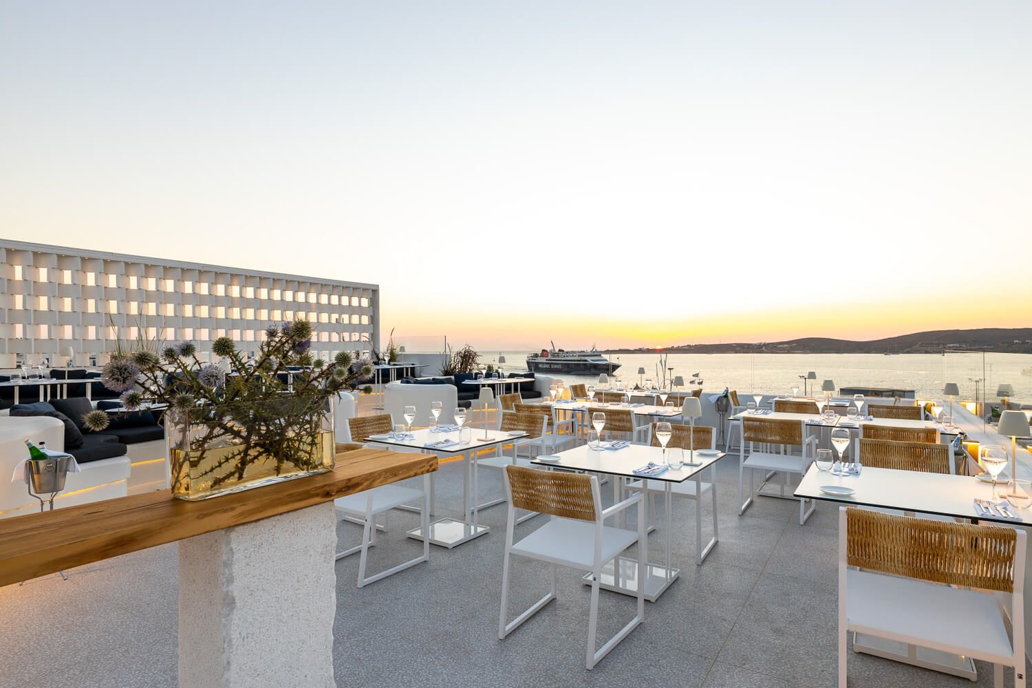 The ultimate Mediterranean dining setting above the Aegean Sea