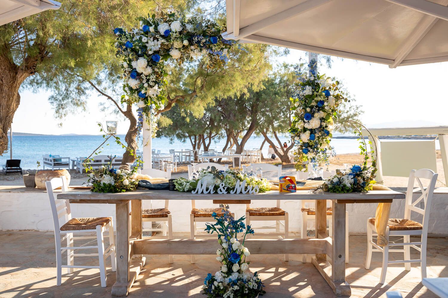 Beautifully decorated outdoor wedding tables at Thalassamou Paros