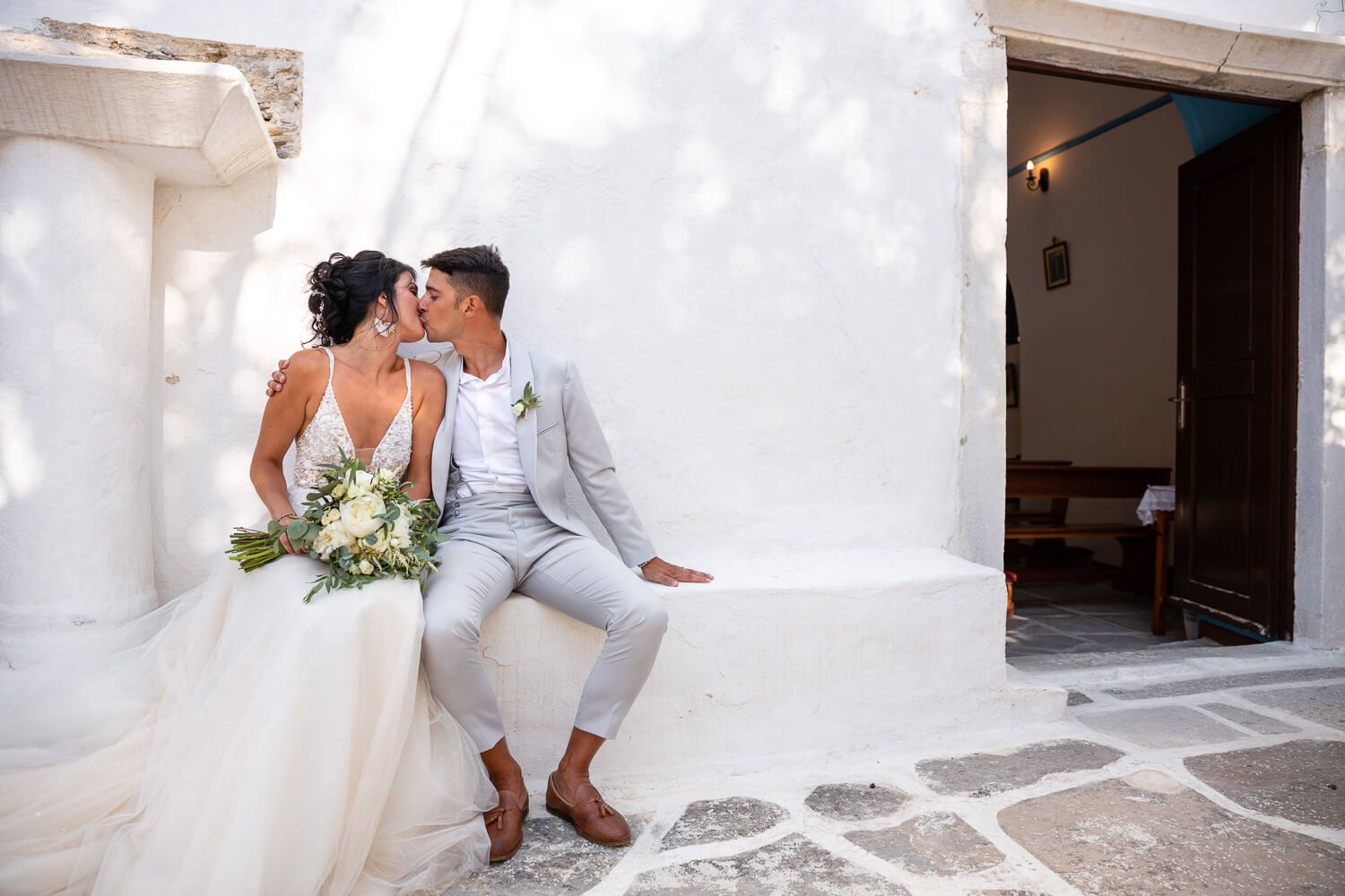 Intimate moment between the Italian couple during their Paros destination wedding