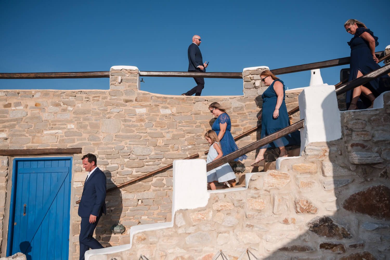 Guests gathering during an intimate wedding ceremony overlooking the sea at Villa Lady of Paros