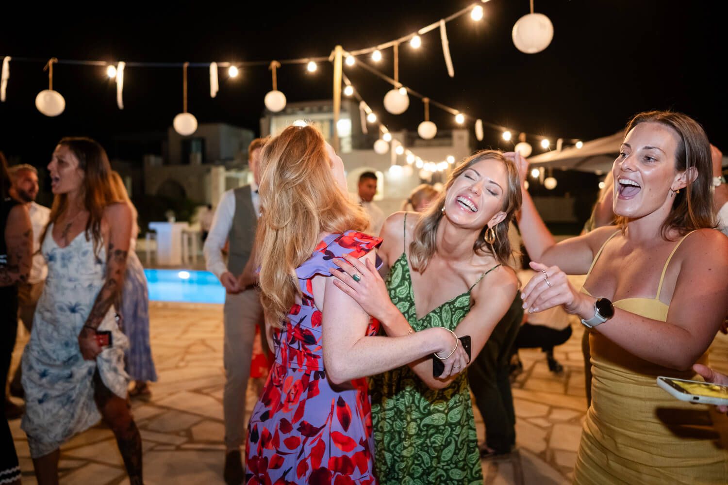Nighttime wedding photography of a fun party at Villa Virginia