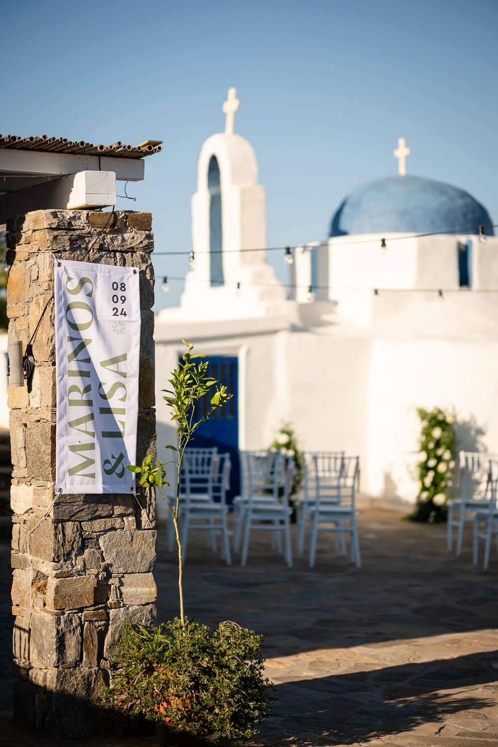 The traditional whitewashed Agia Marina chapel at The Secret View wedding venue