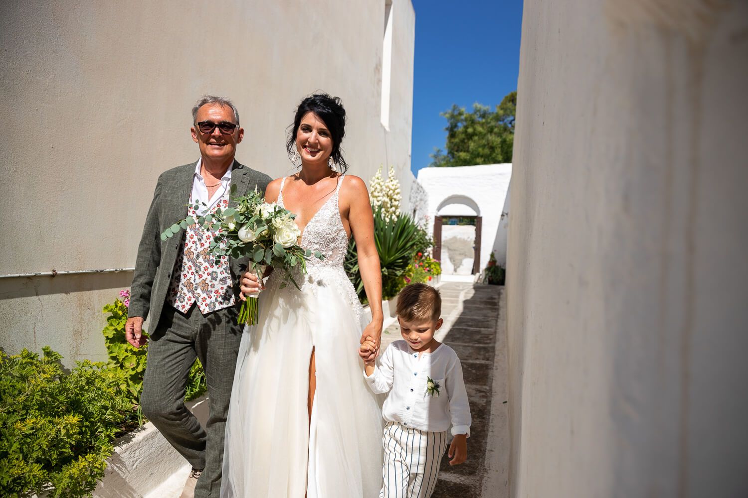 Emotional moment of the bride's father leading her down the aisle