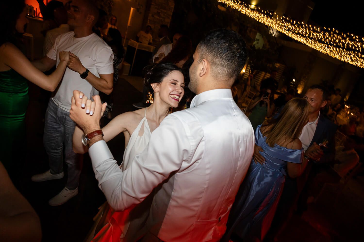 Dimitra and Akshay sharing their romantic first dance at Villa Komito