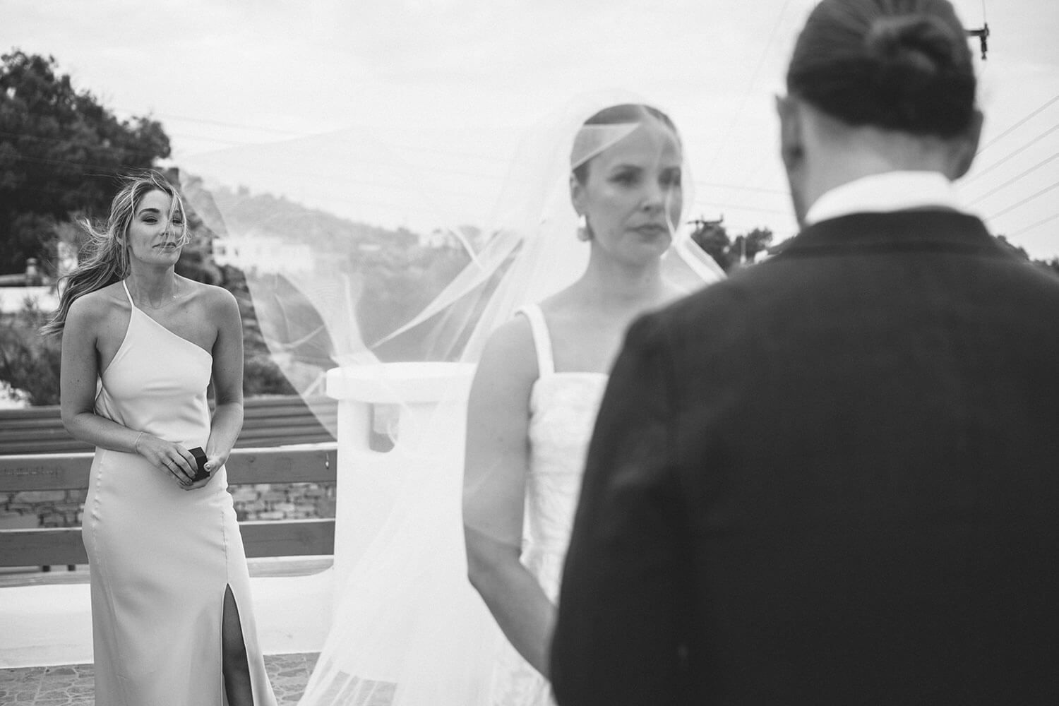Bride smiling warmly while exchanging vows at her Paros elopement