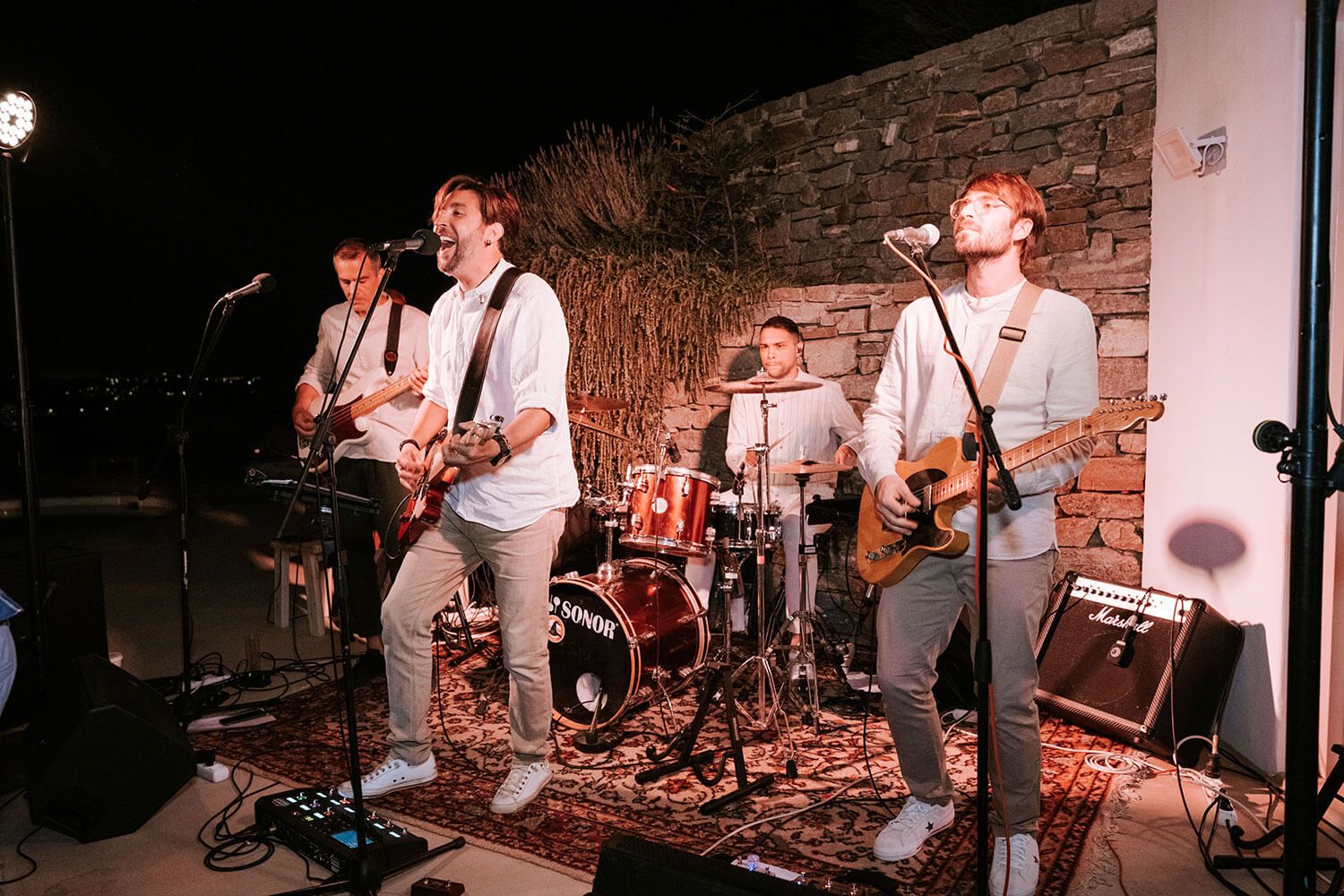 Groom's rockstar performance at his wedding reception in Greece