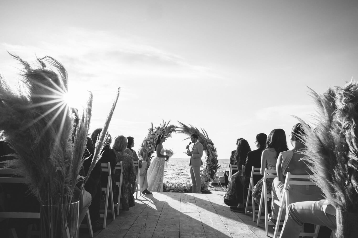Outdoor wedding altar with stunning floral decorations at Seesoo Paros