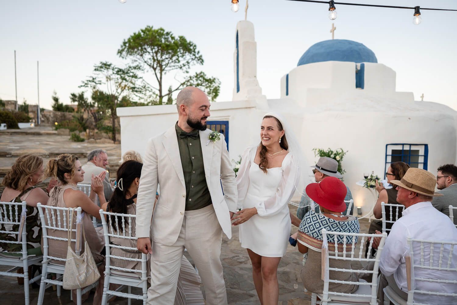 Happy newlyweds walking together after their ceremony at The Secret View