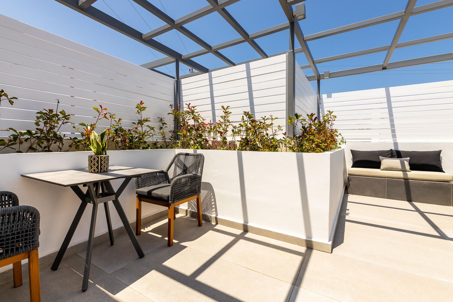 The inviting ambiance of a luxury suite's exterior environment in Paros
