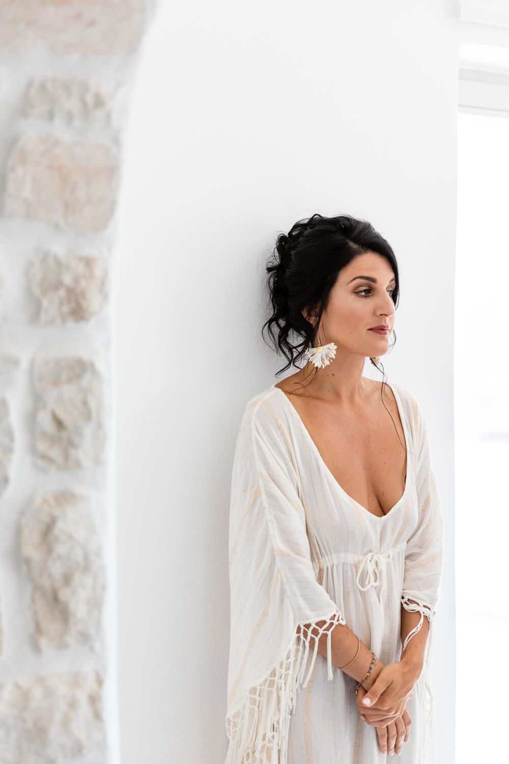 Bride Erika getting ready for her Catholic Italian wedding in Paros at Villa Aethra