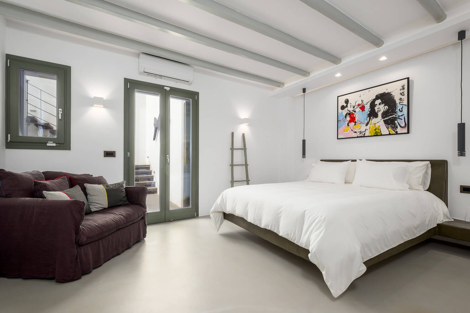 Spacious en-suite bedroom portraying comfort and luxury