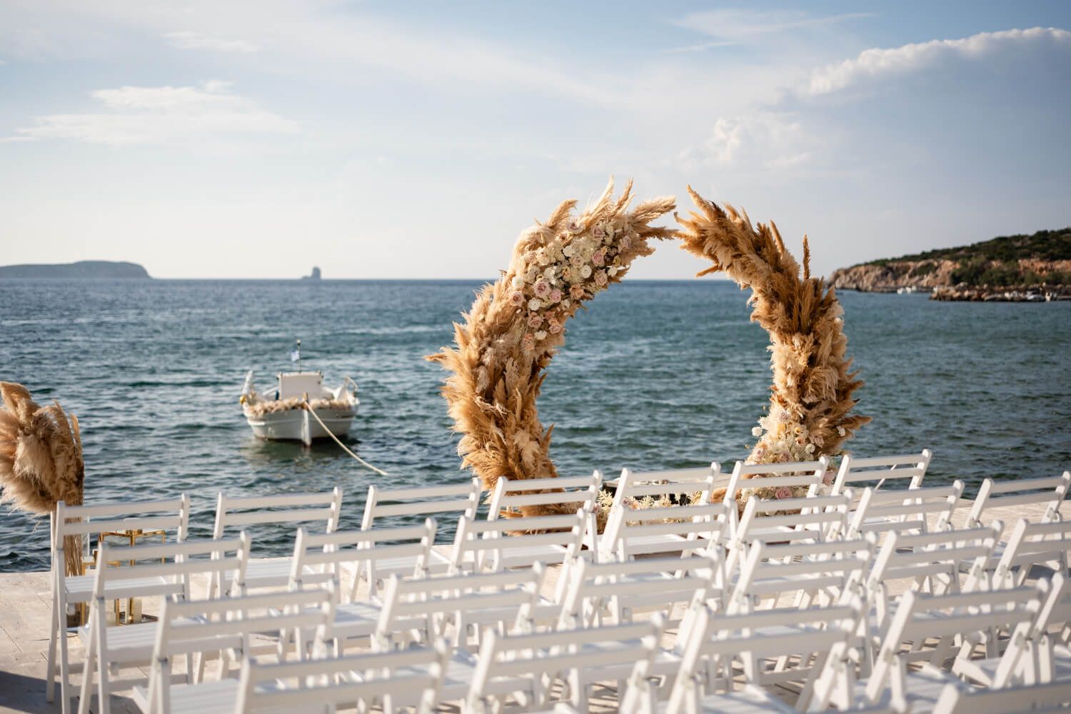 Outdoor wedding altar with stunning floral decorations at Seesoo Paros