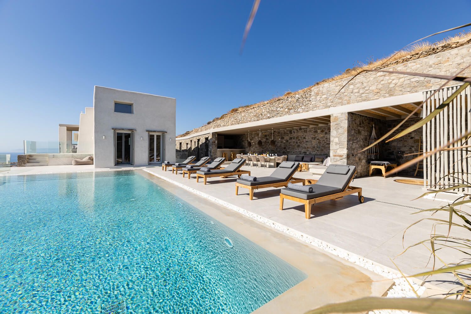 Residential styling extending to a luxury pool terrace in Paros