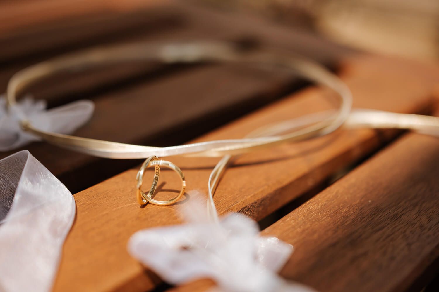 Close up of wedding rings and stefana in Paros Greece