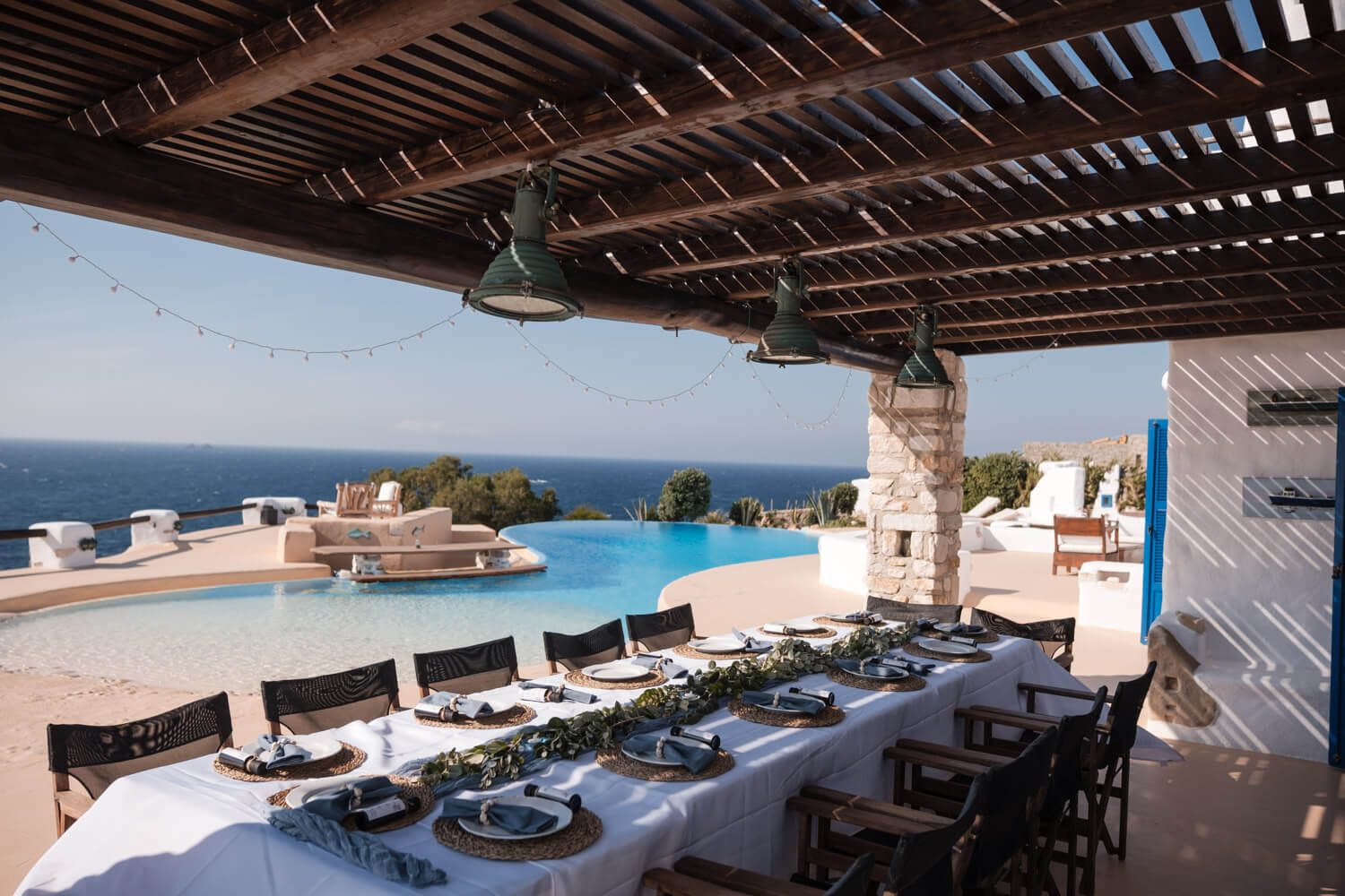 Elegant poolside wedding dinner setup at Villa Lady of Paros