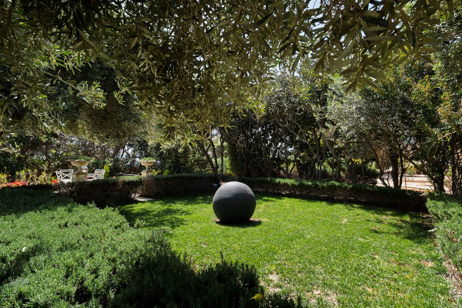 Expansive lush gardens surrounding a luxury Paros property
