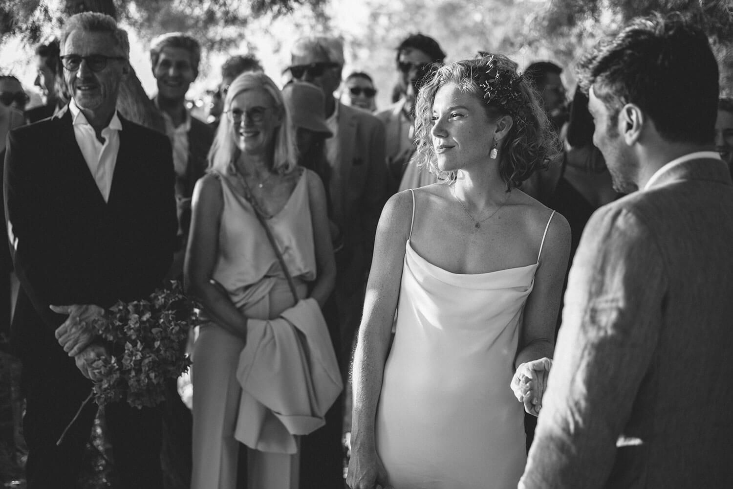 Touching wedding ceremony right on the beach at Thalassa Mou restaurant