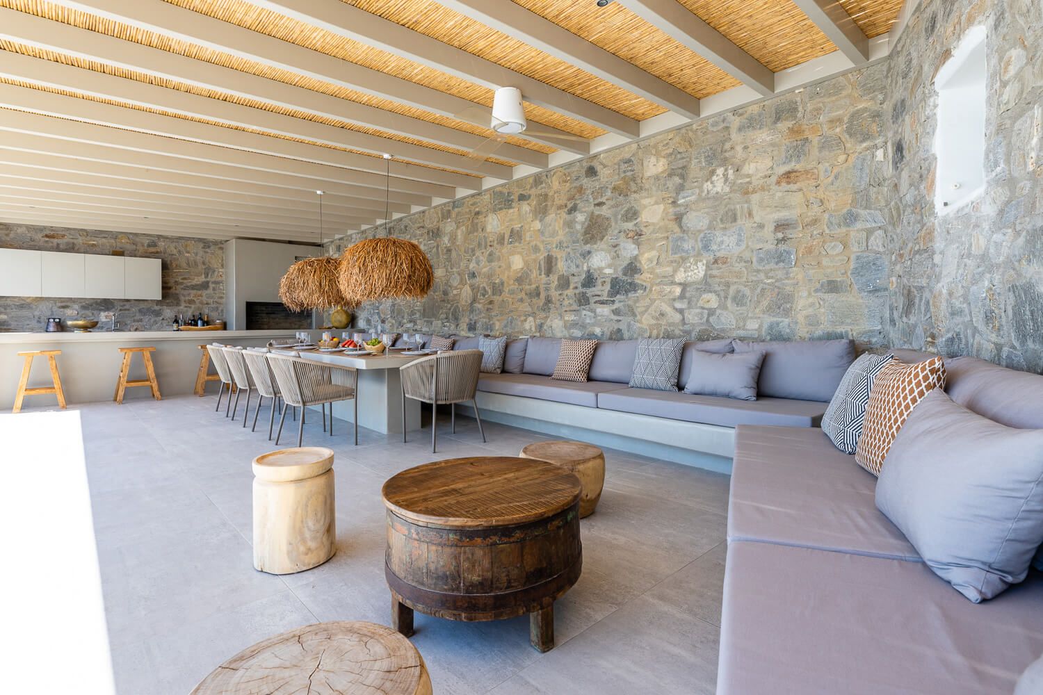exposed walls of an outdoor sitting area of a premium Cycladic property